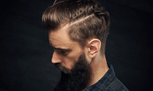 man-with-hardpart-haircut-and-beard
