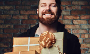 bearded-man-holding-gifts