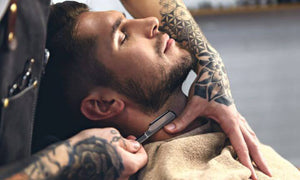 barber-shaving-mans-neckbeard